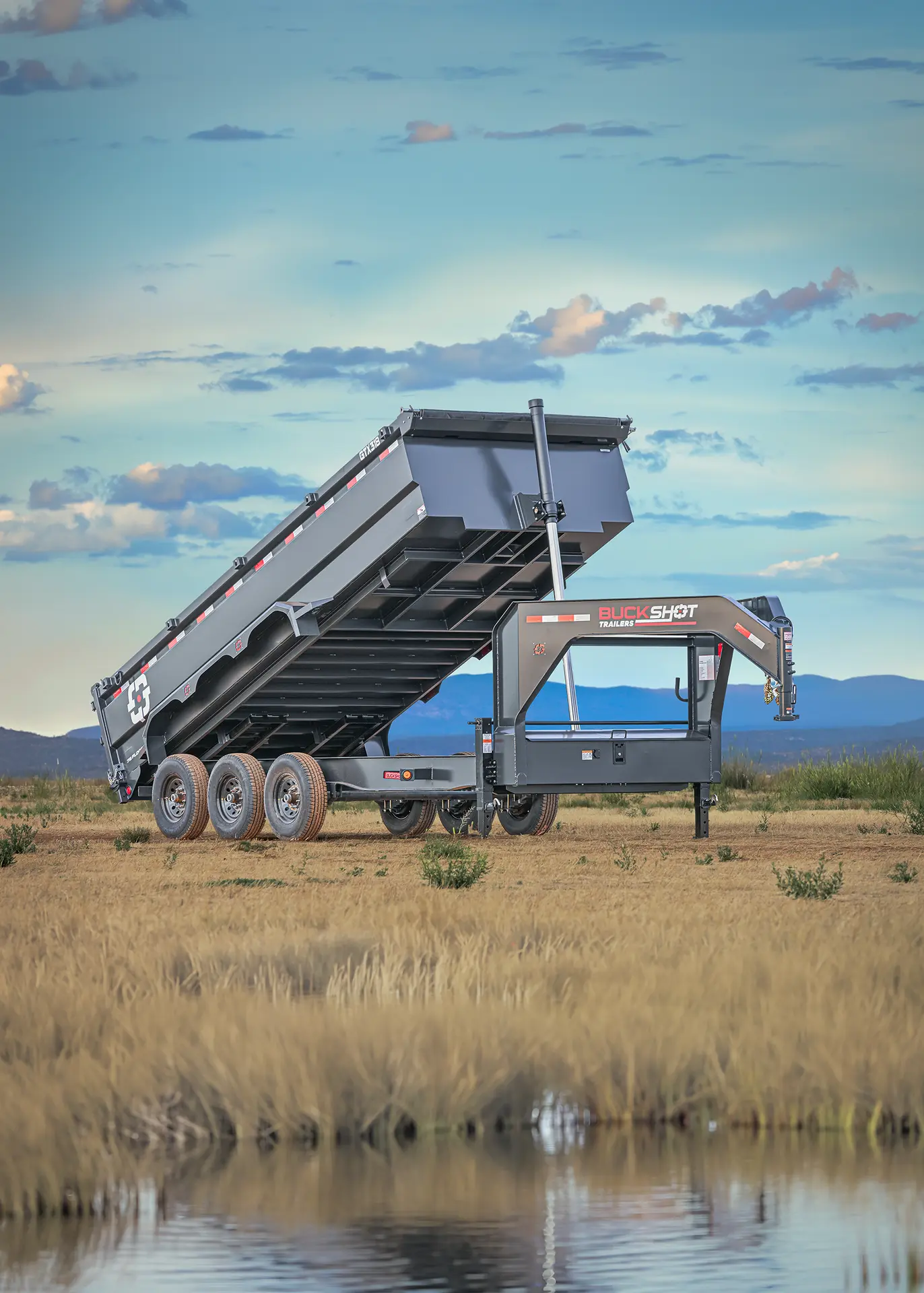 Buckshot GTX Series triple-axle gooseneck dump trailer with 7K axles, represented by the GTX 318