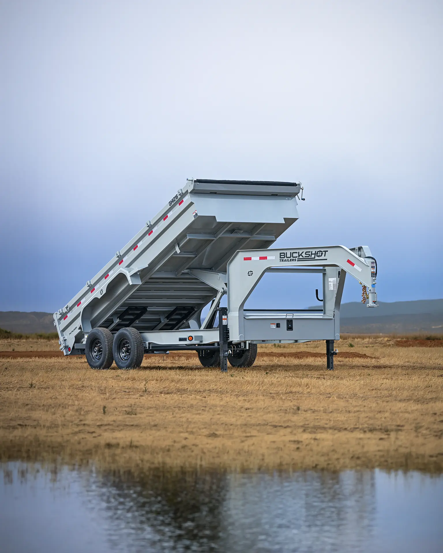 Buckshot GHI Series gooseneck dump trailer with 7K axles, represented by the GHI 216