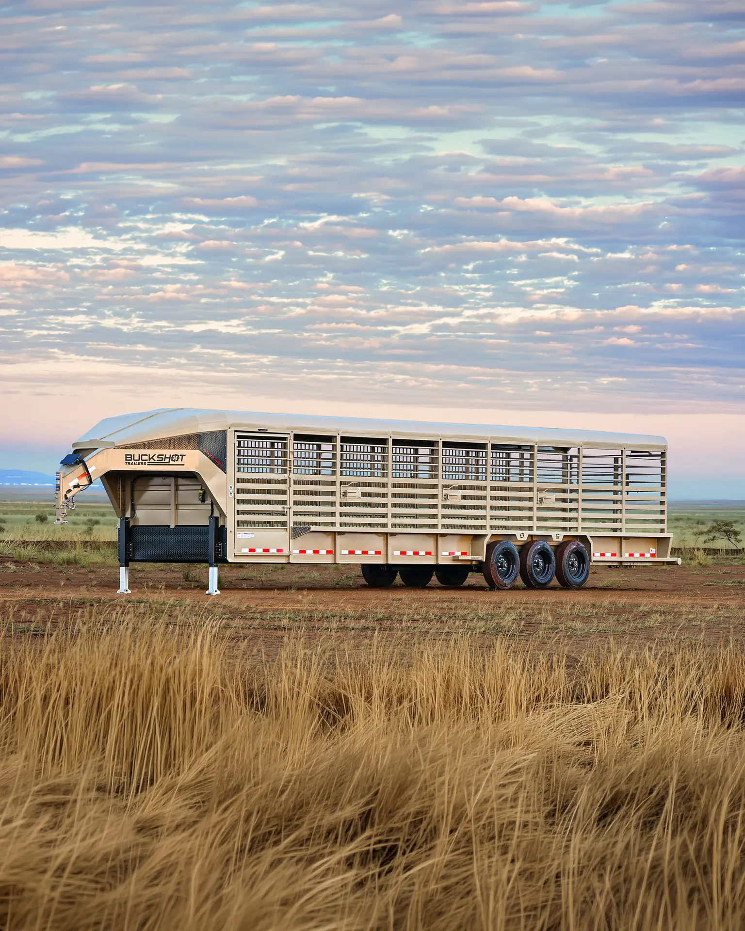 Buckshot Stock Lite X Series triple axle gooseneck livestock trailer in Desert Tan