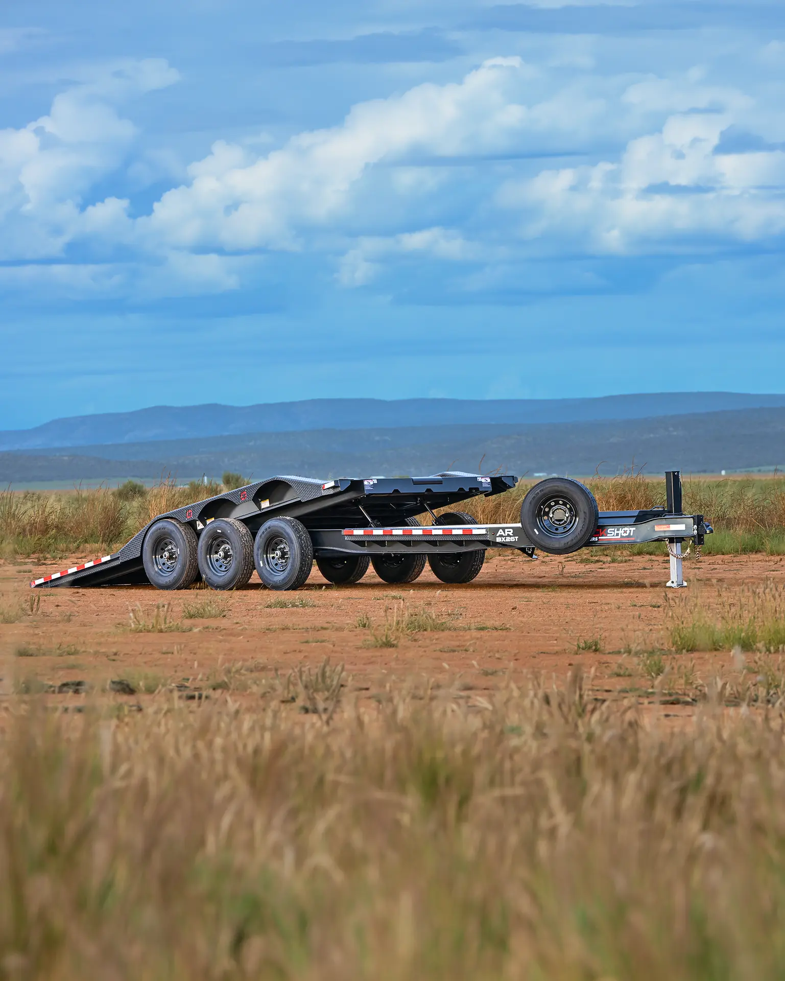 Buckshot AR B-XT Series triple axle bumper pull tilt equipment trailer