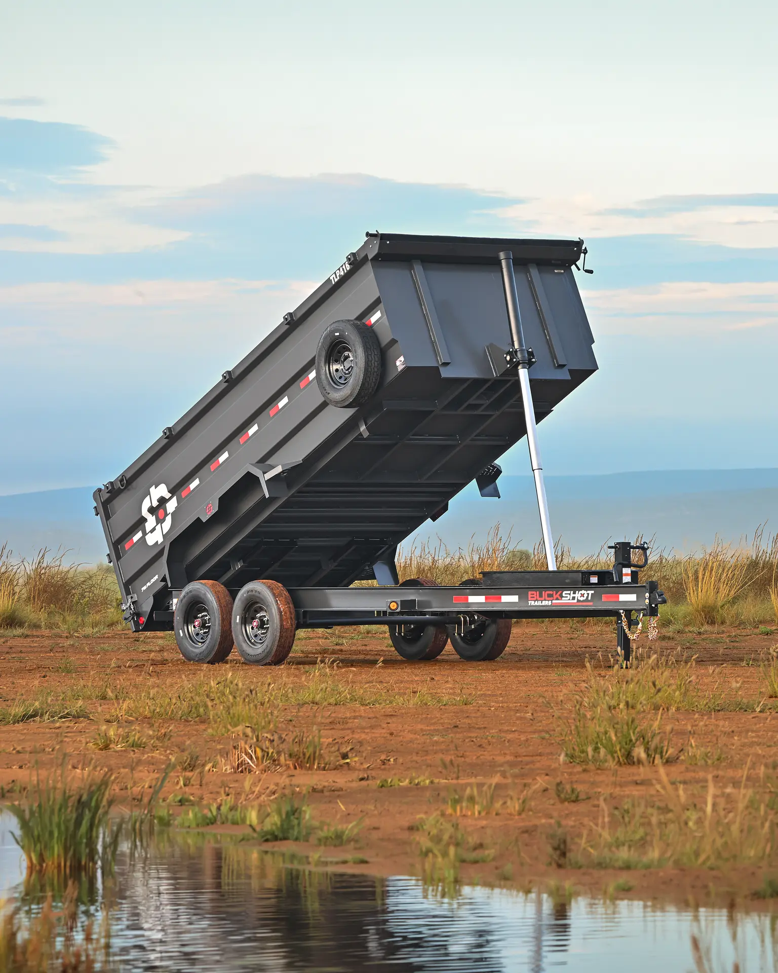 Buckshot TLP Series bumper pull telescopic dump trailer in Gunmetal Gray, represented by the TLP316