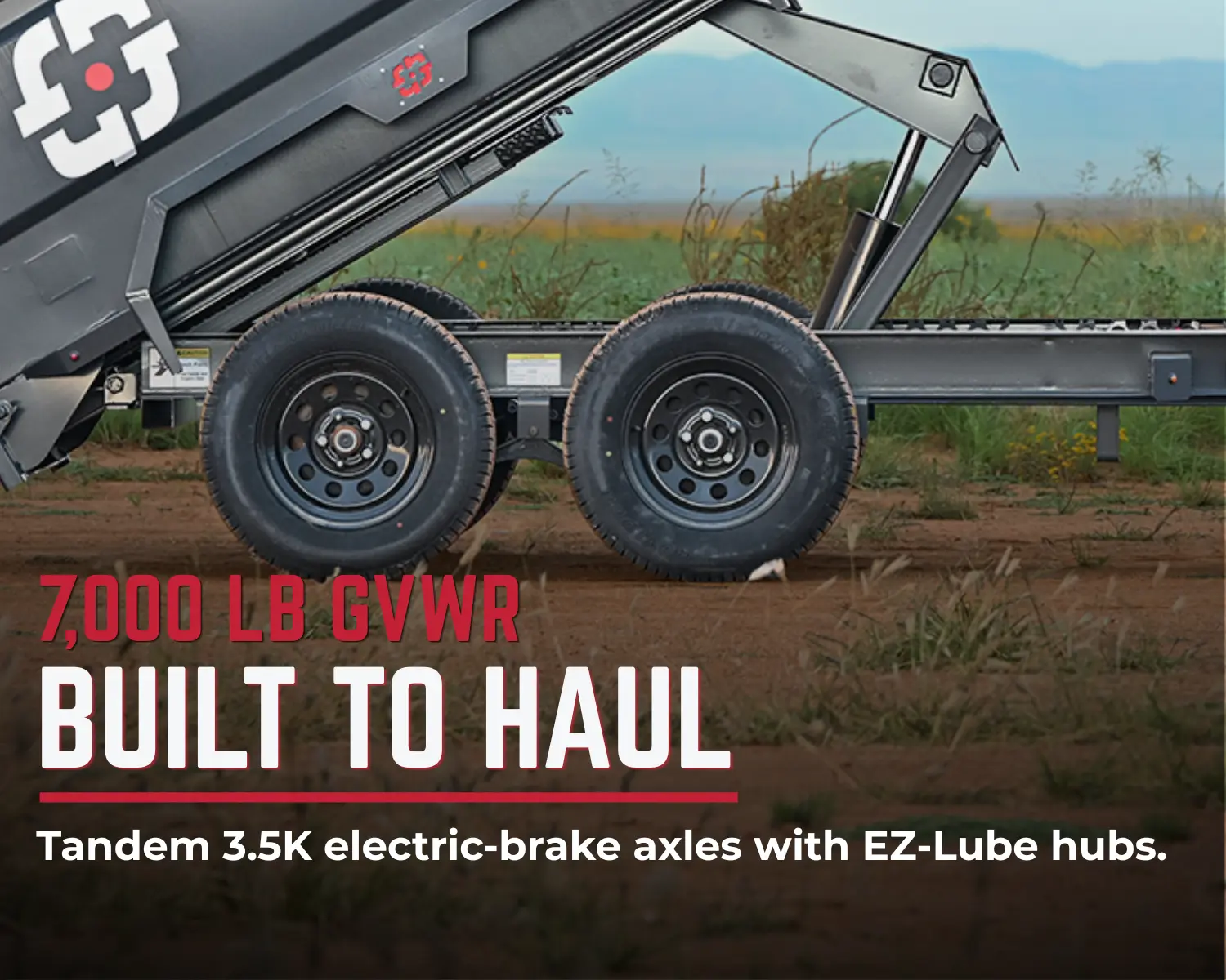 Blue bumper pull dump trailer with tall side walls