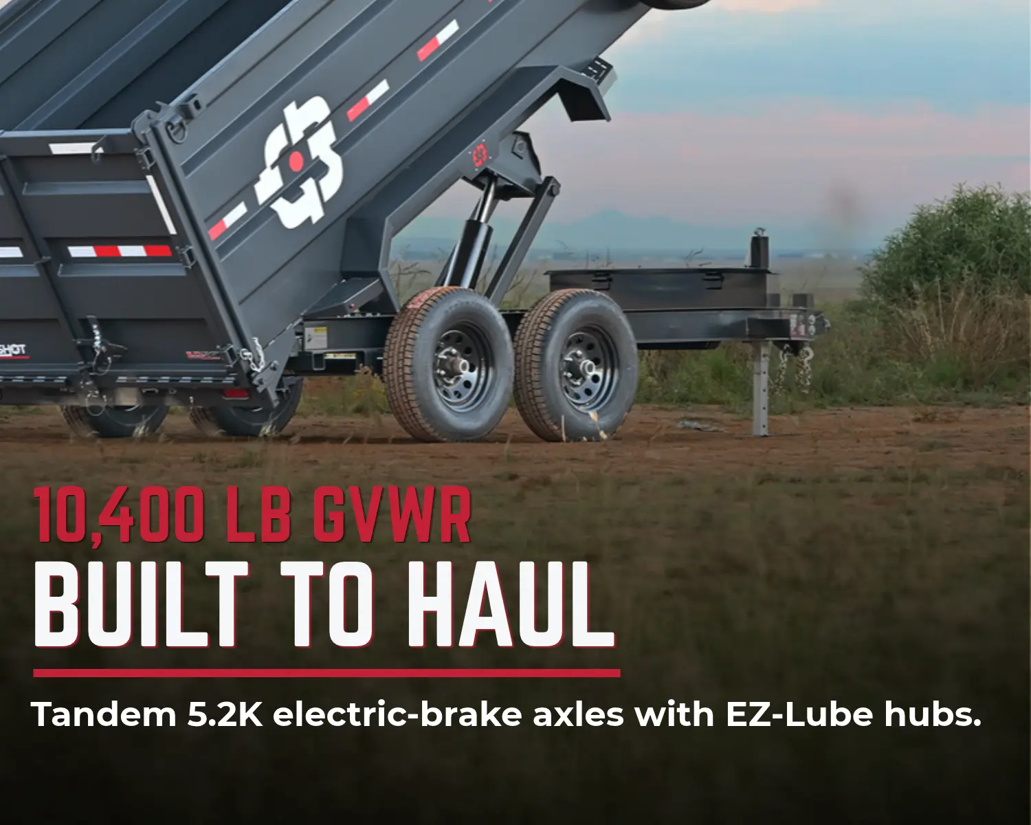 Bumper pull dump trailer prepared for hauling